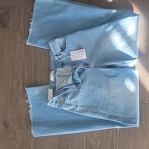 High rise, raw hem, wide leg jeans